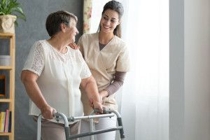 Nurse Helping Senior to Walk — Lehi, UT — Bellaview Assisted Living