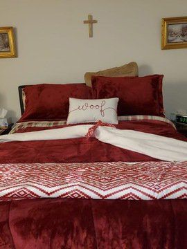 Red Pillow and Bed — Cherry Hill, NJ — Ray of Sunshine Cleaning