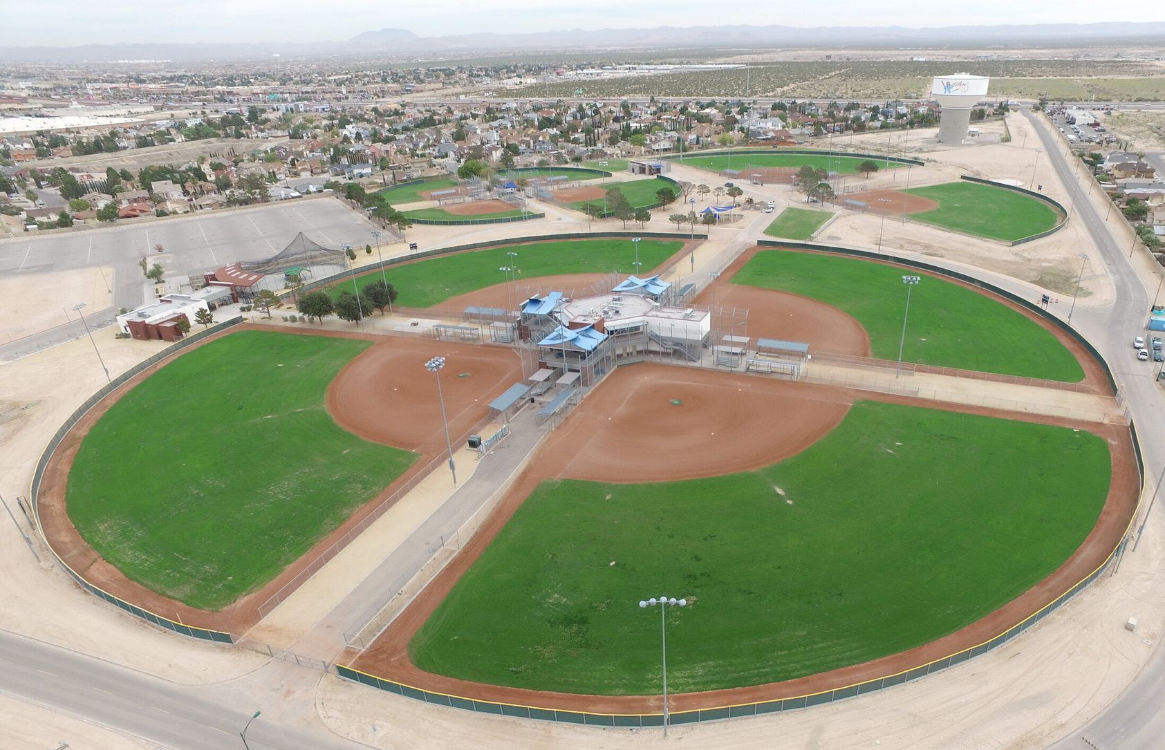 An aerial view of a baseball field with a circle in the middle