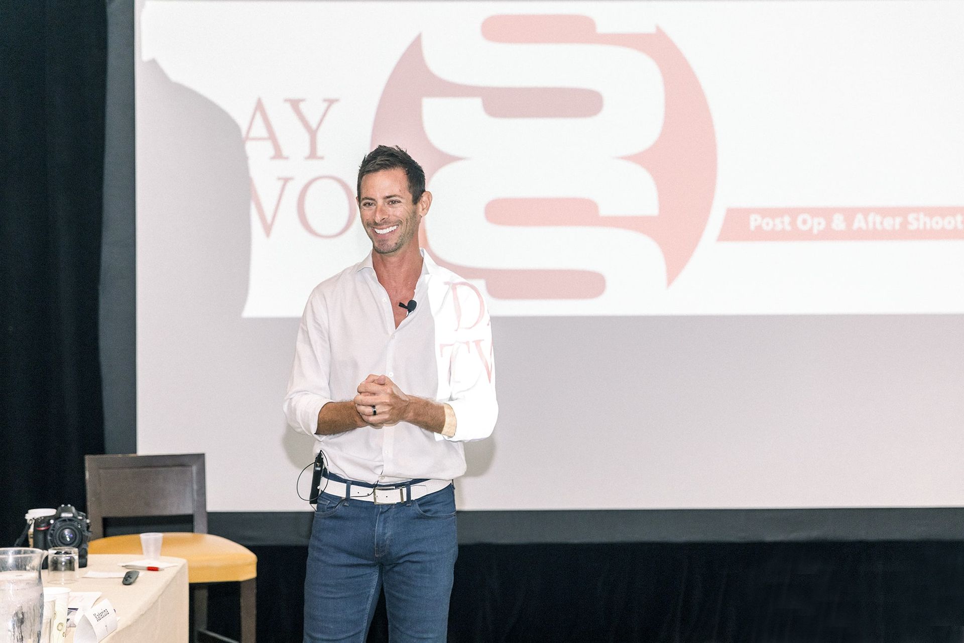 A picture of Dr. Olitsky presenting to a group