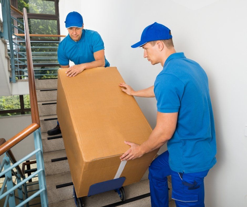 two movers moving box