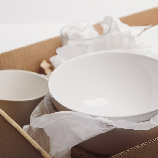 dishes in a box