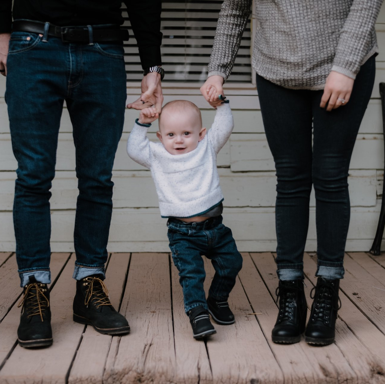 Family Photo holding hands at Schnepf Farms