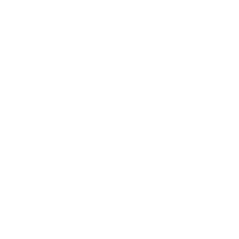 Man with long gray beard and sunglasses wearing headphones, typing on a laptop.