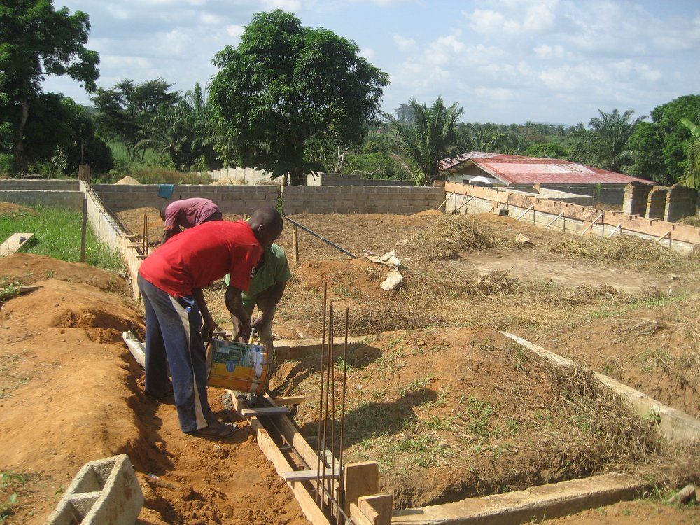 A group of people are working on a construction site