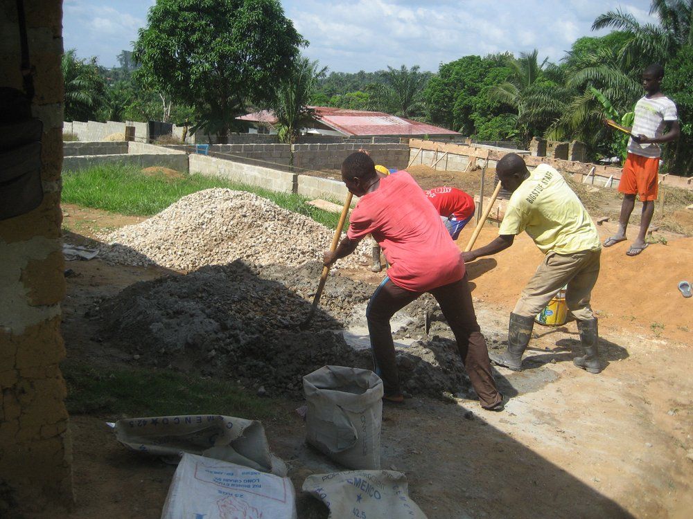 A group of people are working on a construction site