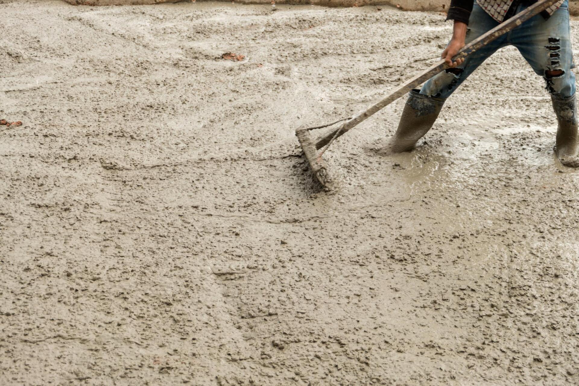worker in boots in the cement