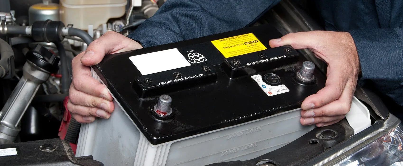 Changing Car Battery — A Grade Oils & Batteries In Wodonga VIC