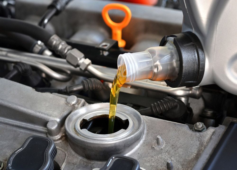 Changing car engine oil — A Grade Oils & Batteries In Wodonga VIC