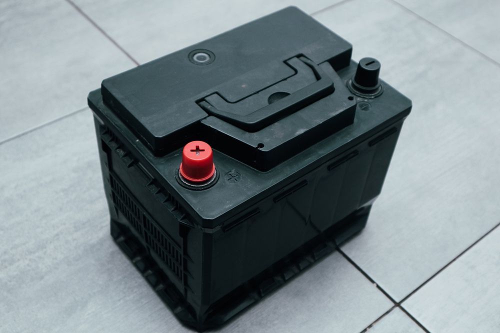 Charging car battery with electric current — A Grade Oils & Batteries In Myrtleford VIC