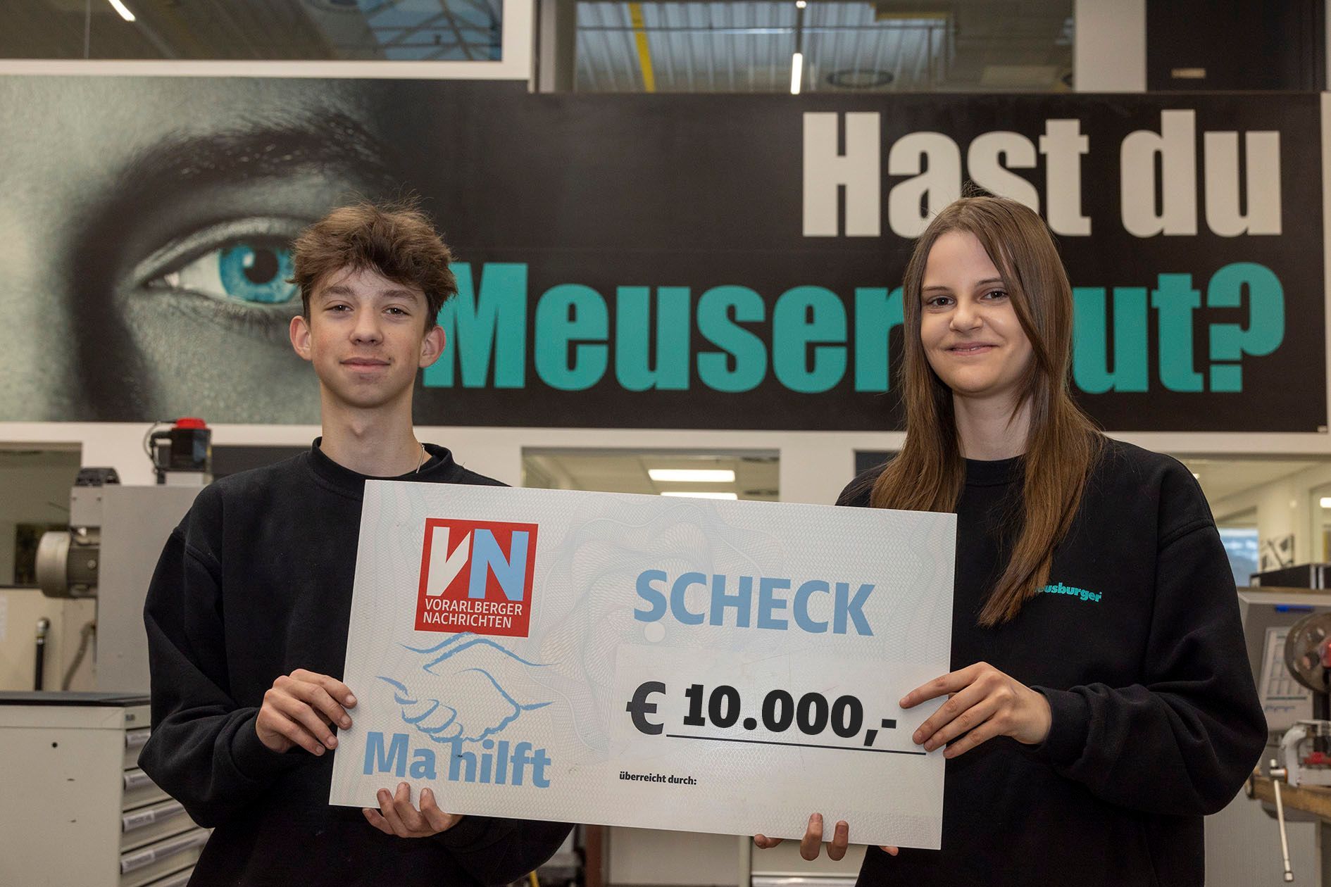 Scheckübergabe Meusburger: 10.000 €