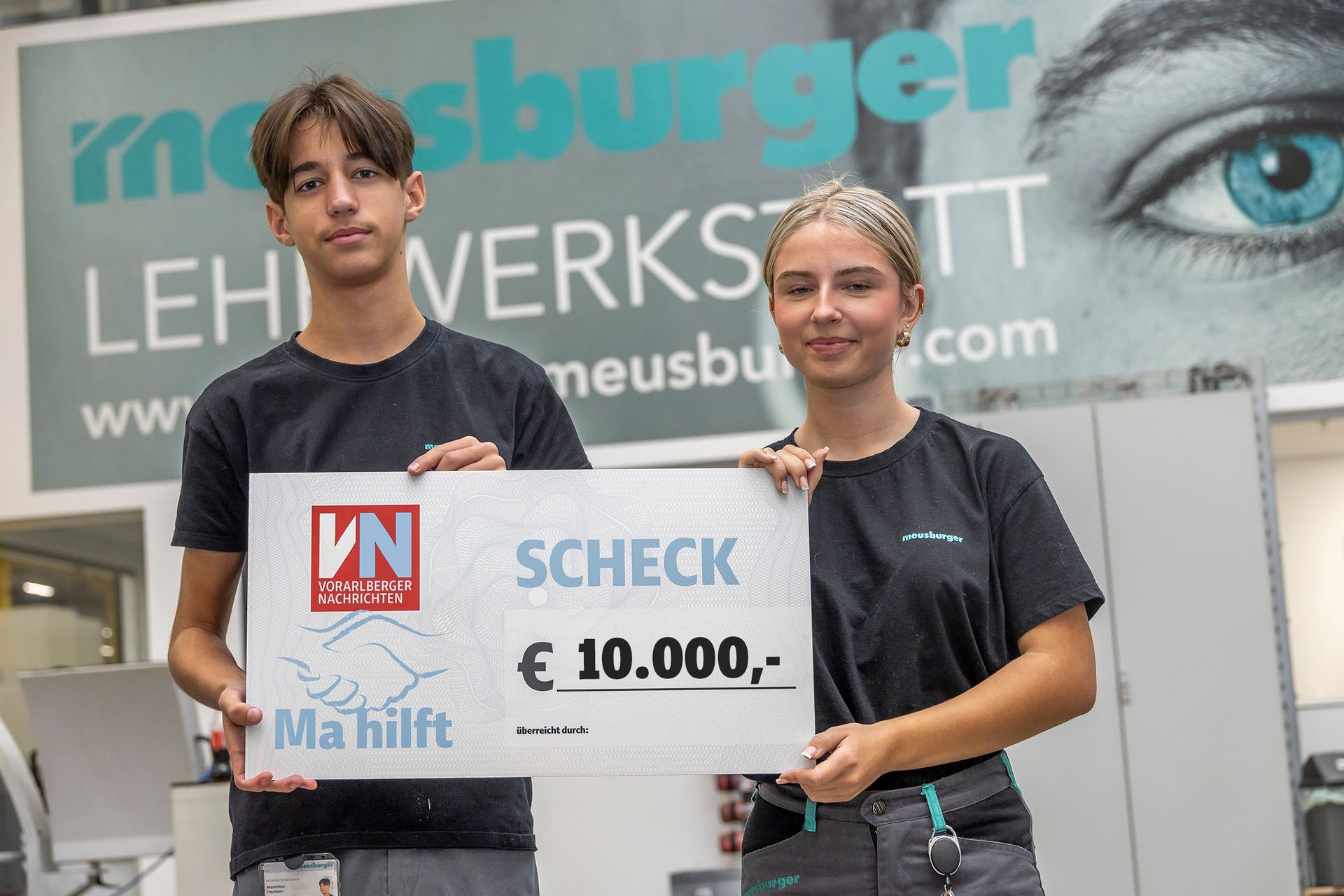 Scheckübergabe Meusburger: 10.000 €