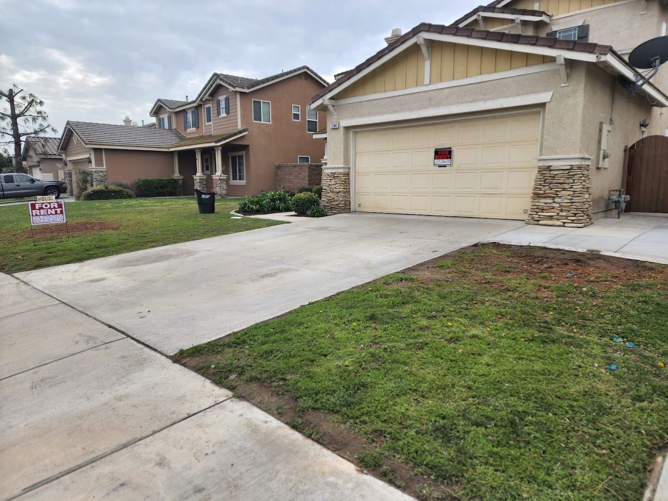 A house with a garage and a sign that says i love you