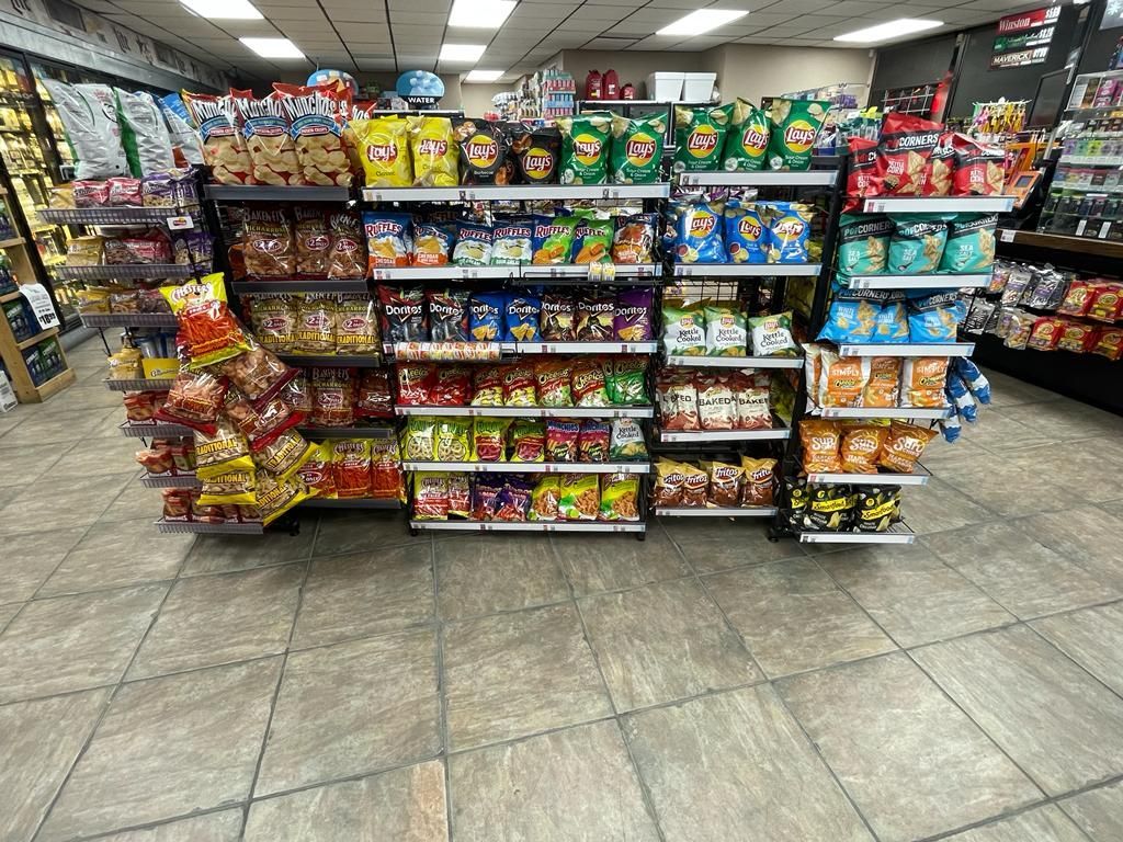 A grocery store filled with lots of snacks and chips.