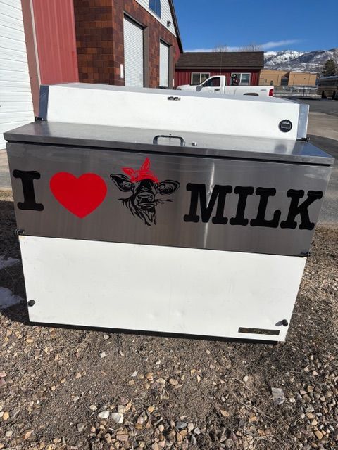 A cooler that says i love milk on it