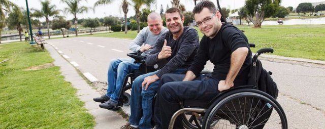 men in wheel chair