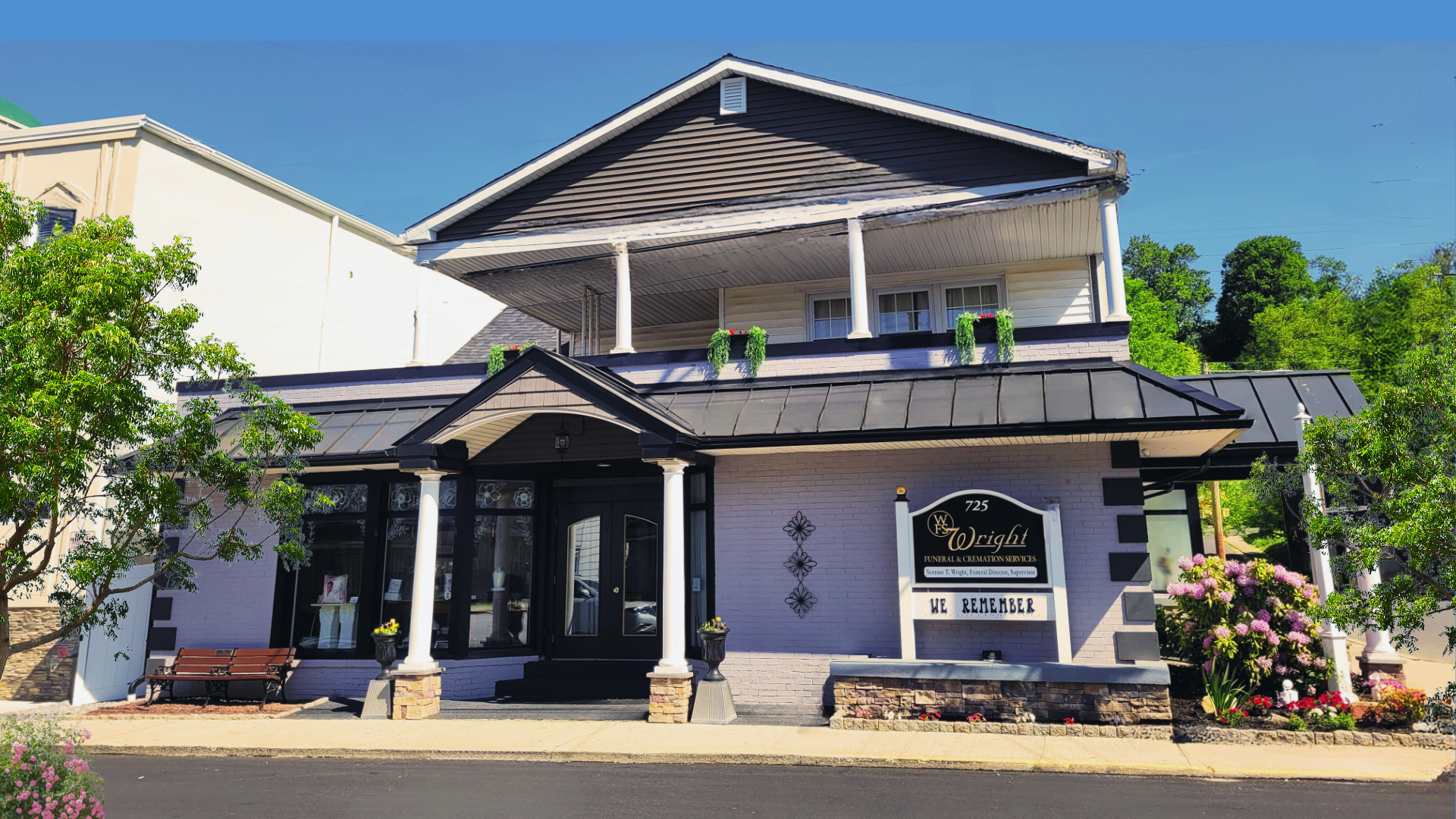 A church with a cross on the front of it