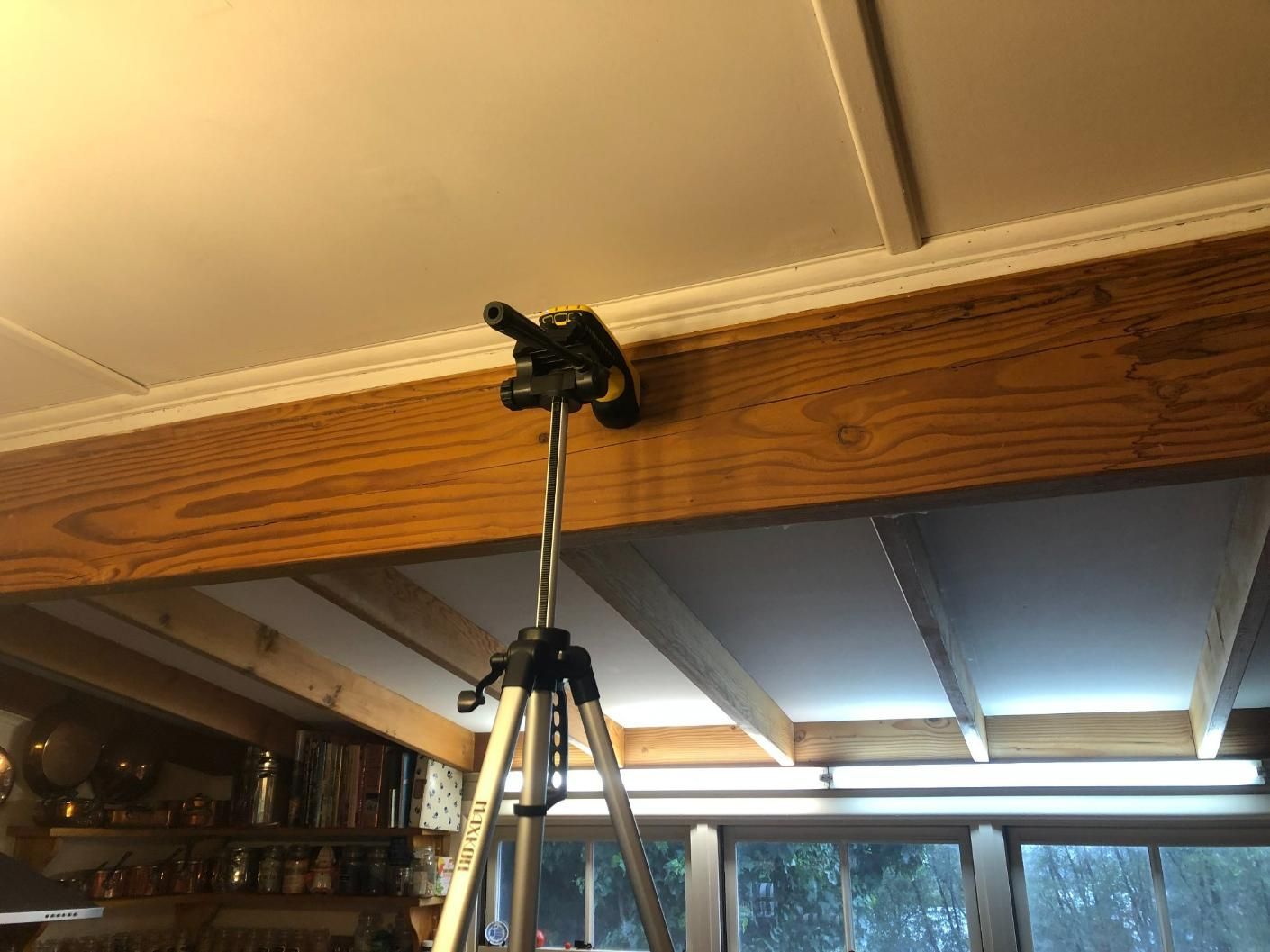 A Pest Control Device is Hanging From the Ceiling of a Room — TC Pest & Termite Control In Bowral, NSW