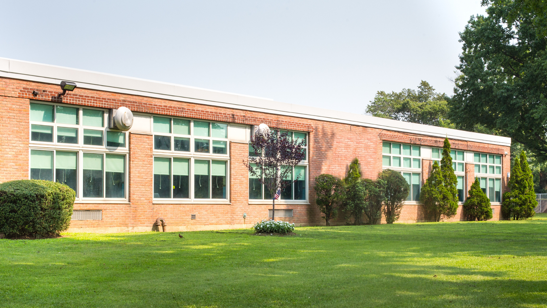 A large brick building with a lot of windows