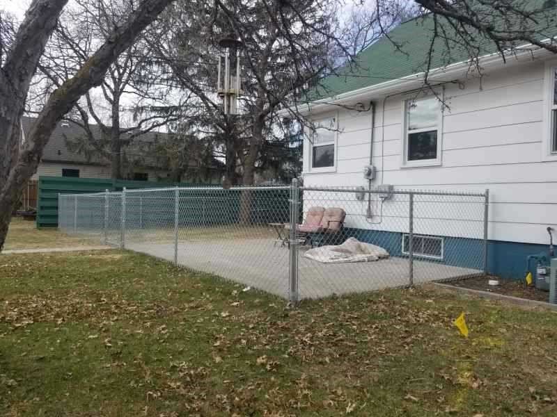 Fencing — White House with Fence in Deerwood, MN