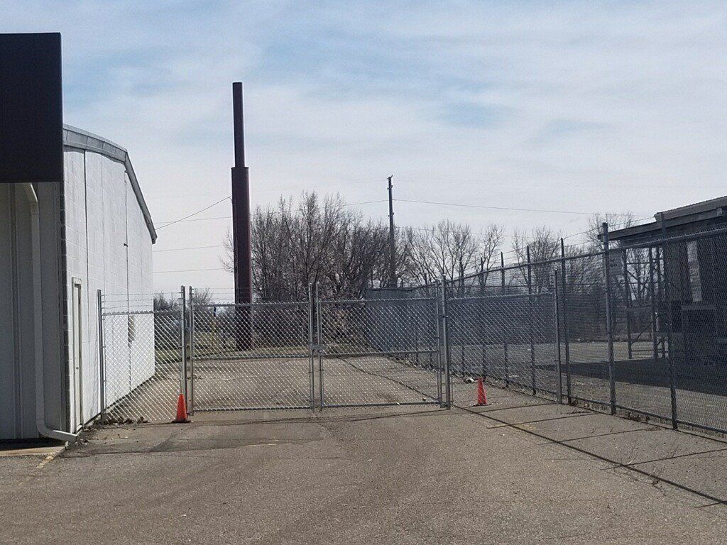 Warehouse Fence — Warehouse with Fence in Deerwood, MN