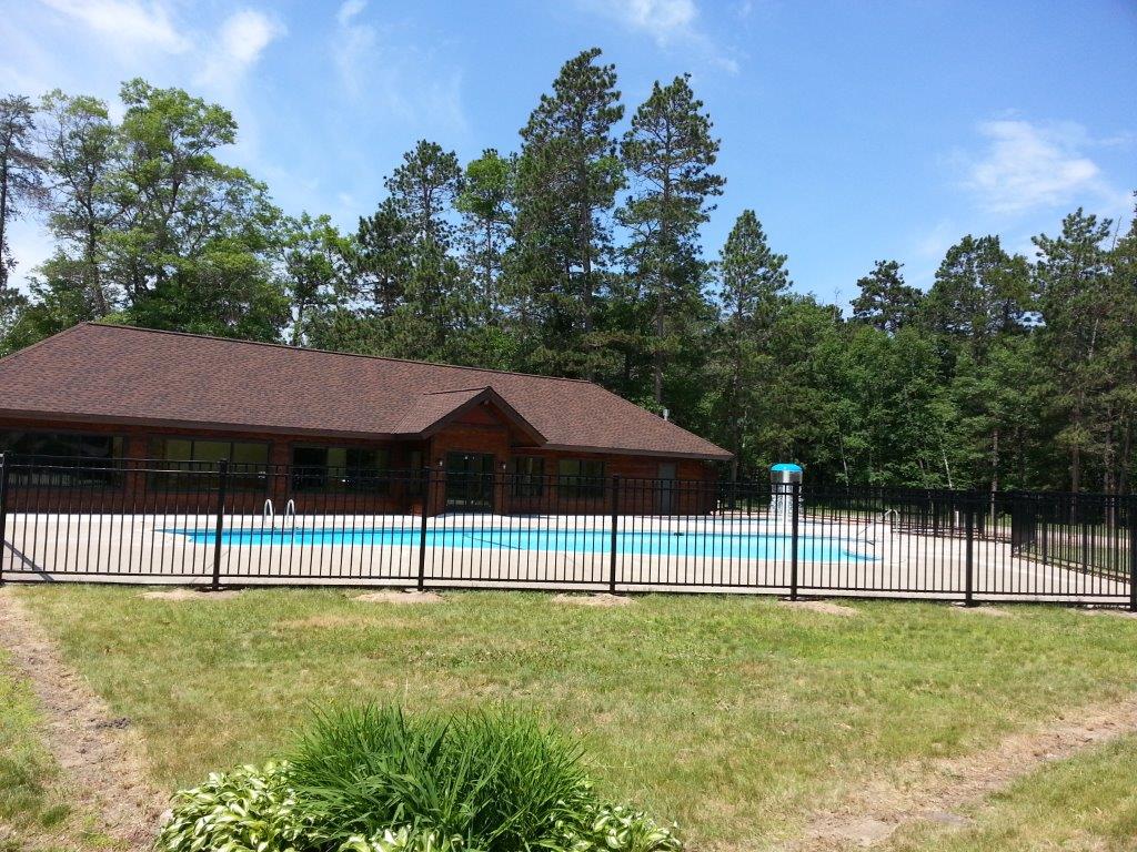 Pool Fencing — House with Pool in Deerwood, MN