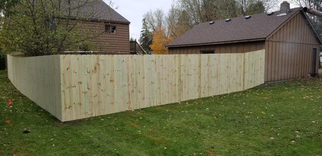House Wooden Fence — House with Wooden Fence in Deerwood, MN
