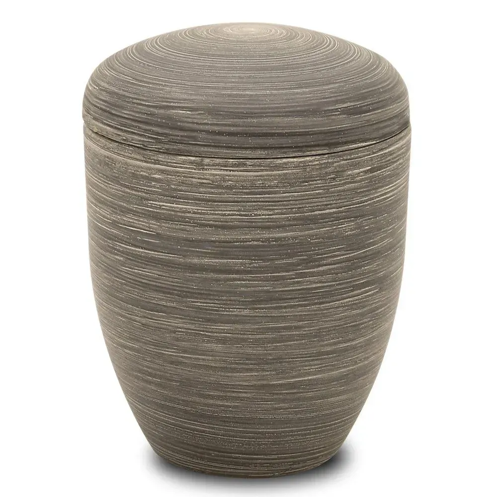Gray textured decorative urn with a rounded lid on a white background