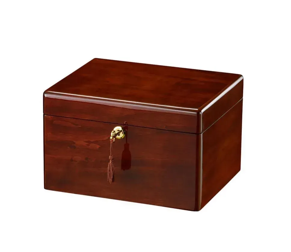 Dark wooden keepsake box with a brass latch and tassel, shown on a white background