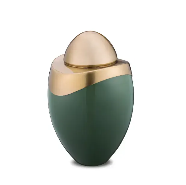 Green and gold decorative urn with a rounded lid on a white background
