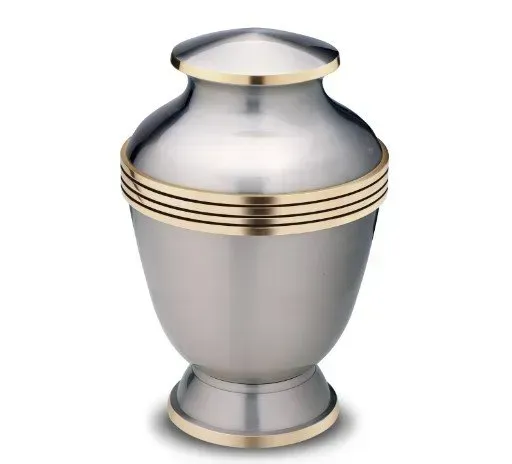 Silver metal urn with gold bands and a pedestal base