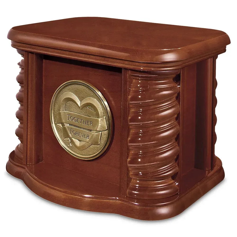 Brown wooden trophy case with a gold medallion emblem on the front