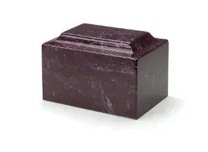 Dark purple decorative box with a raised lid on a white background