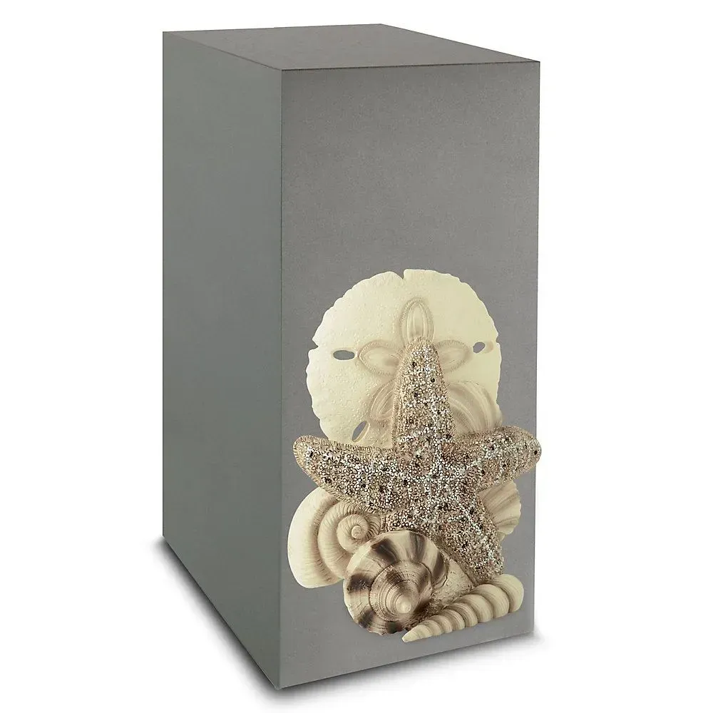 Gray gift box decorated with seashells and a starfish on the front