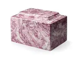 Marbled pink and white rectangular block on a white background