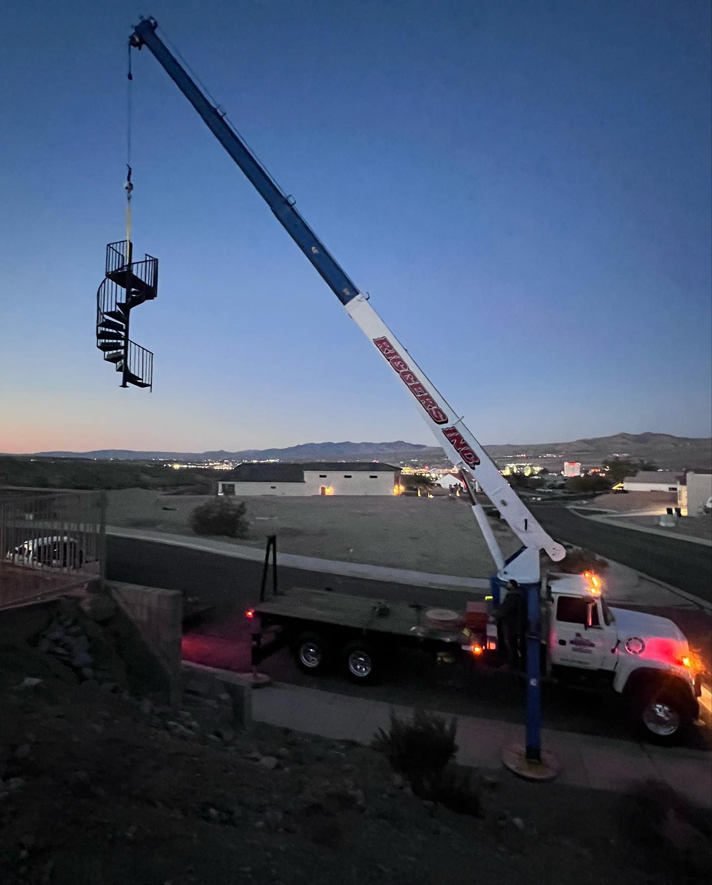 A crane with the word thompson on it