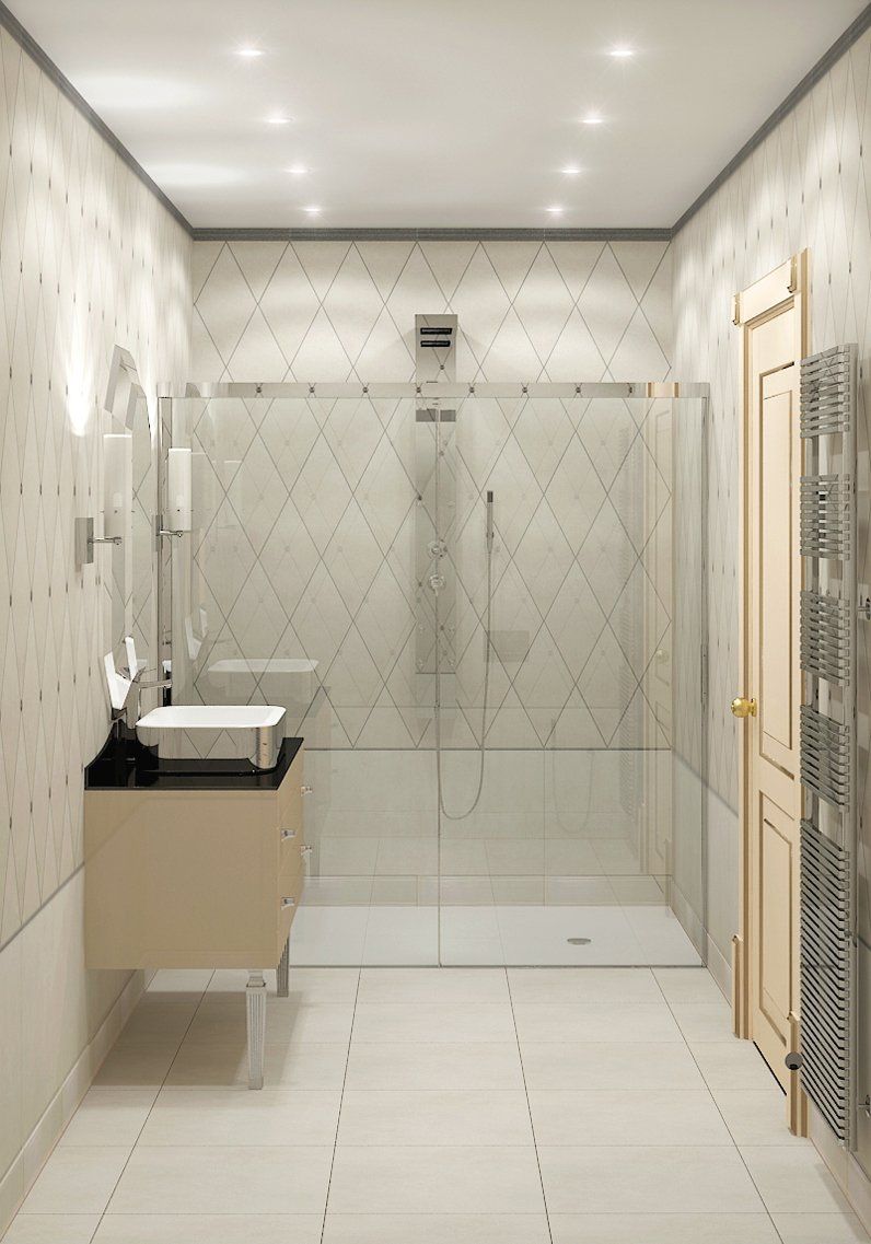 Un bagno con lavandino, specchio e cabina doccia.
