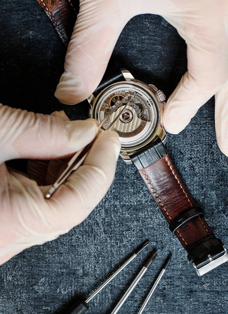 Watchmaker Repairing an Old Wrist Watch — Covington, LA — Michael's Fine Jewelers