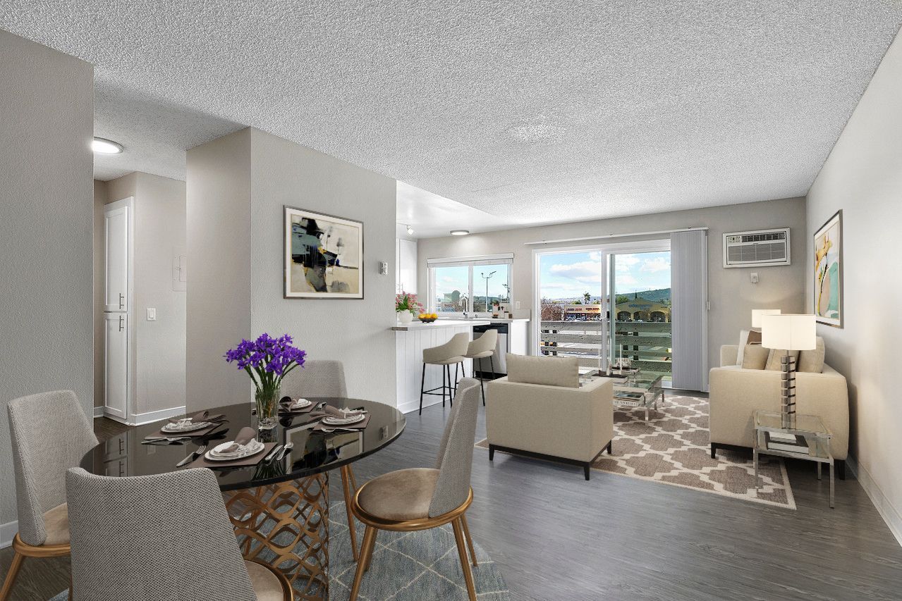 An artist 's impression of a living room and dining room in a apartment.