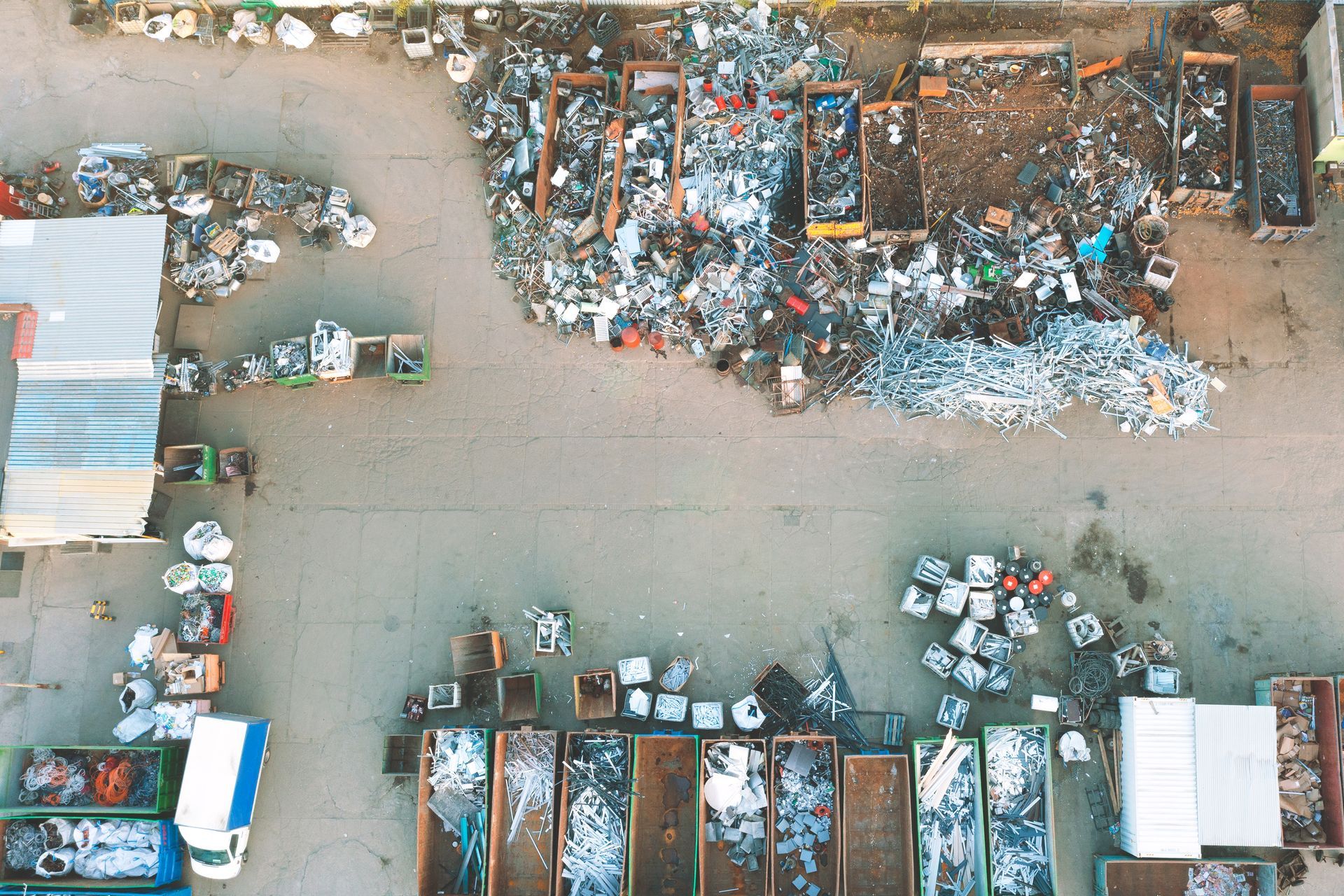 Containers from a height with different types of metal, Sorting for remelting metal products Containers from a height with different types of metal, Sorting for remelting metal products