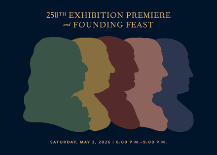 White colonial-style house with porch and green lawn, framed by purple blossoms and trees