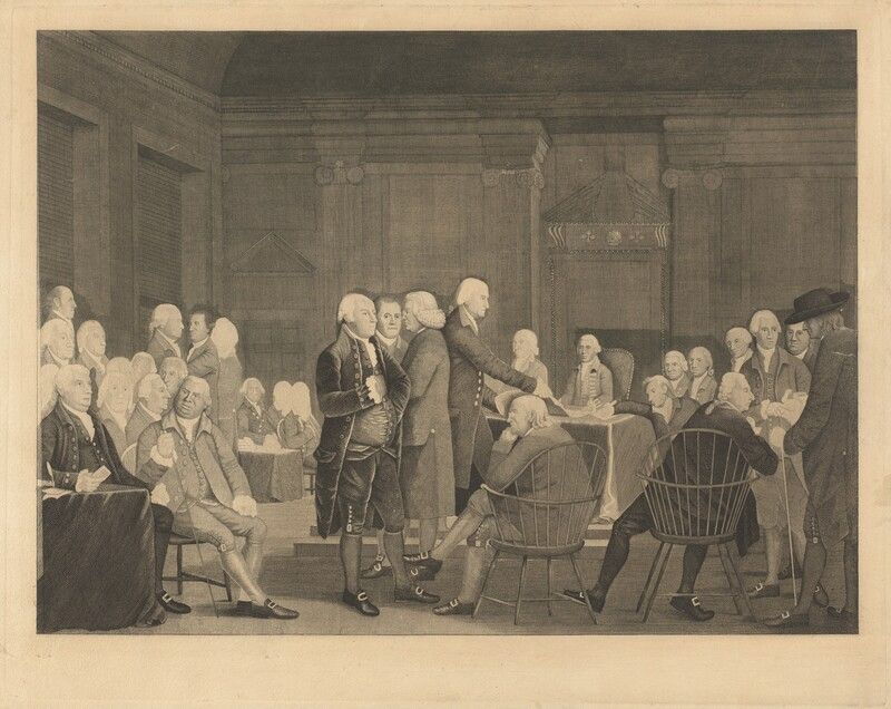 Tea setting on a table, with cups, teapot, and napkins. A window and chairs are in the background.