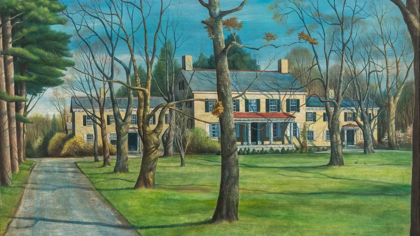 Blue-walled museum room with grandfather clock. Entrance to a room with more clocks.