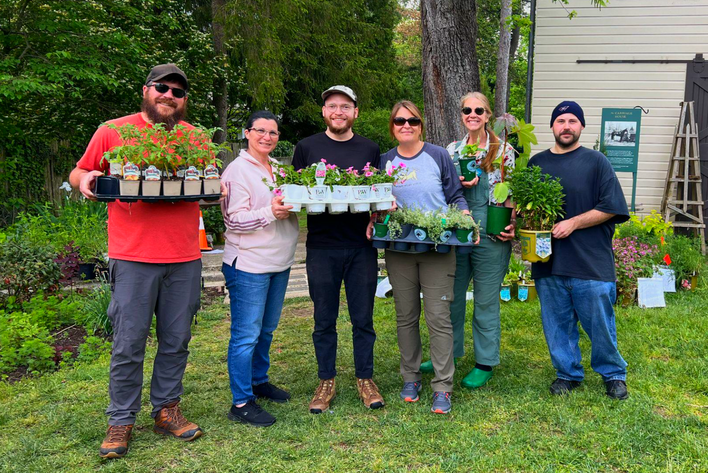 Green doorway to exhibit room with artwork and text 