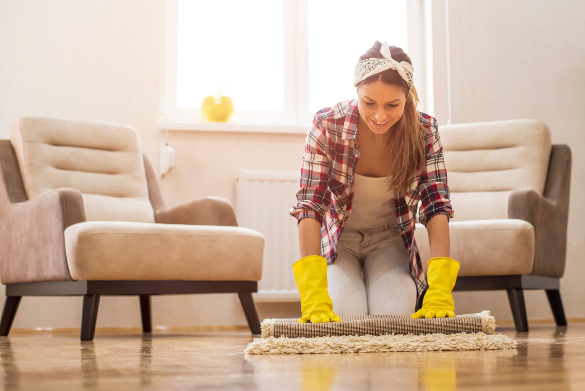 woman cleaning rug