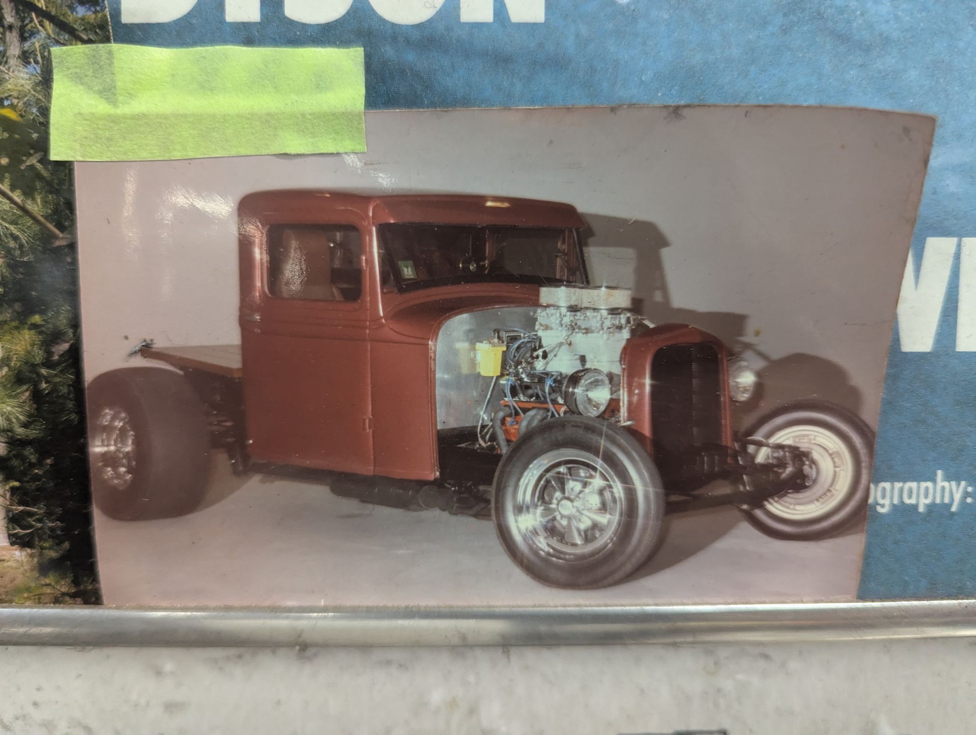 Brown hot rod truck with exposed engine, chrome wheels, and unfinished chassis. | Autobahn Performance Inc
