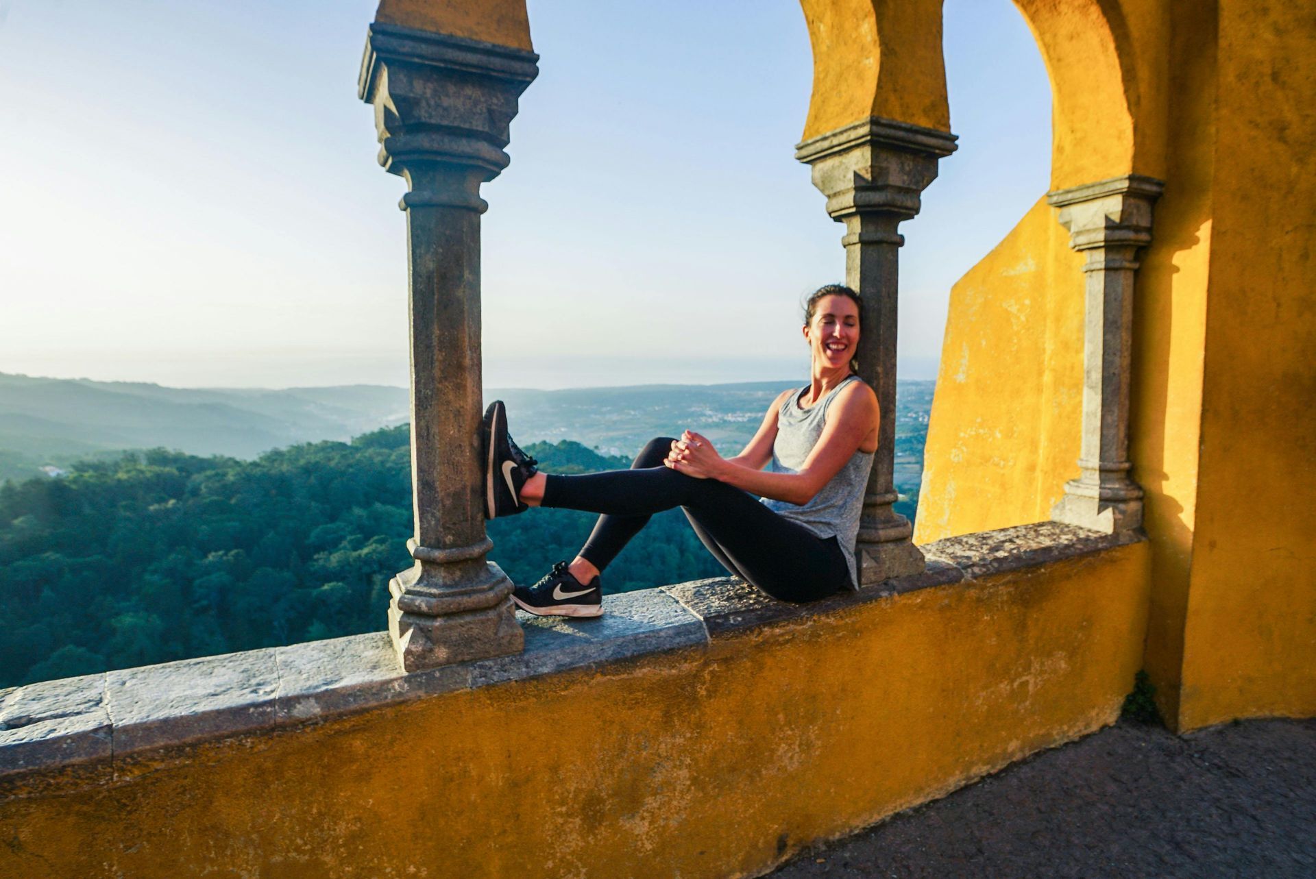 Panoramic view of Pena Palace colorful towers in Sintra forest