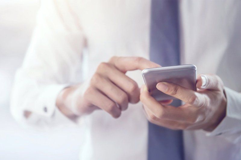 Insurance Agency — Man is Calling Thru Phone in Stronghurst, IL