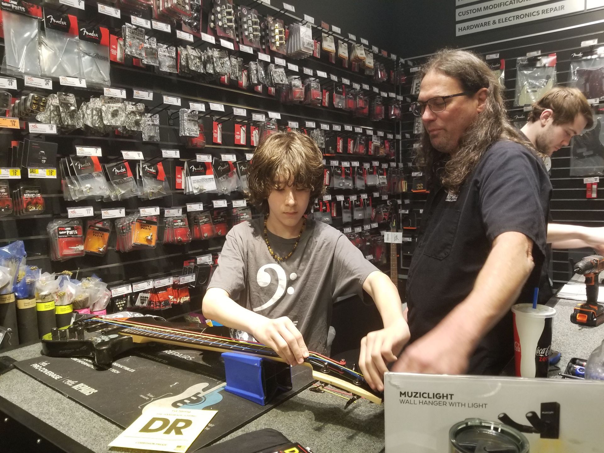 At GC with Jack learning how to change my strings