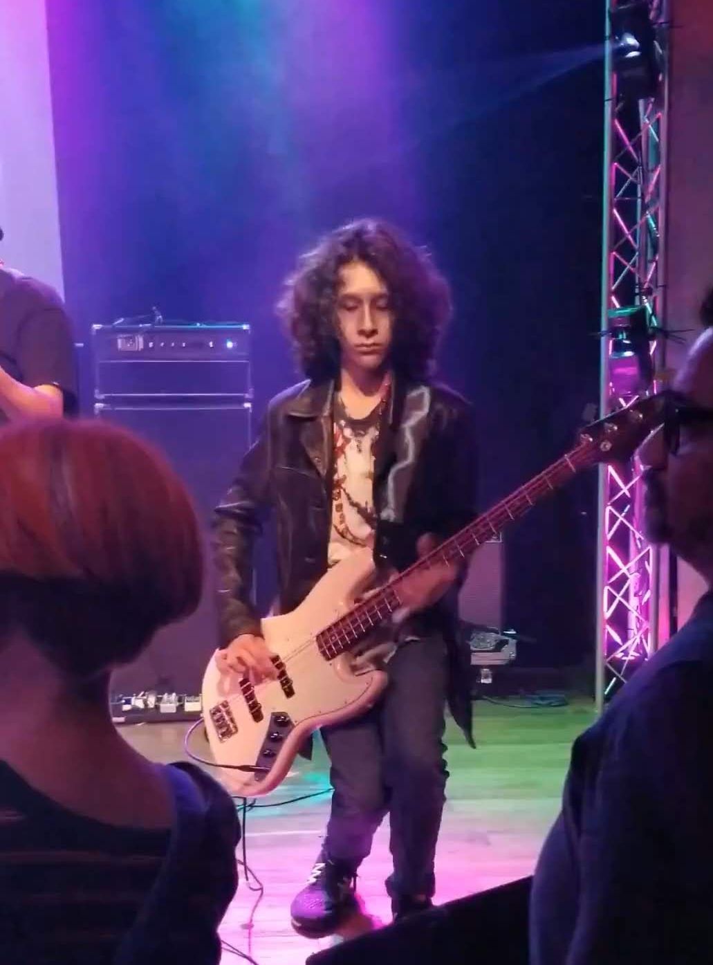 In zombie makeup playing my bass.